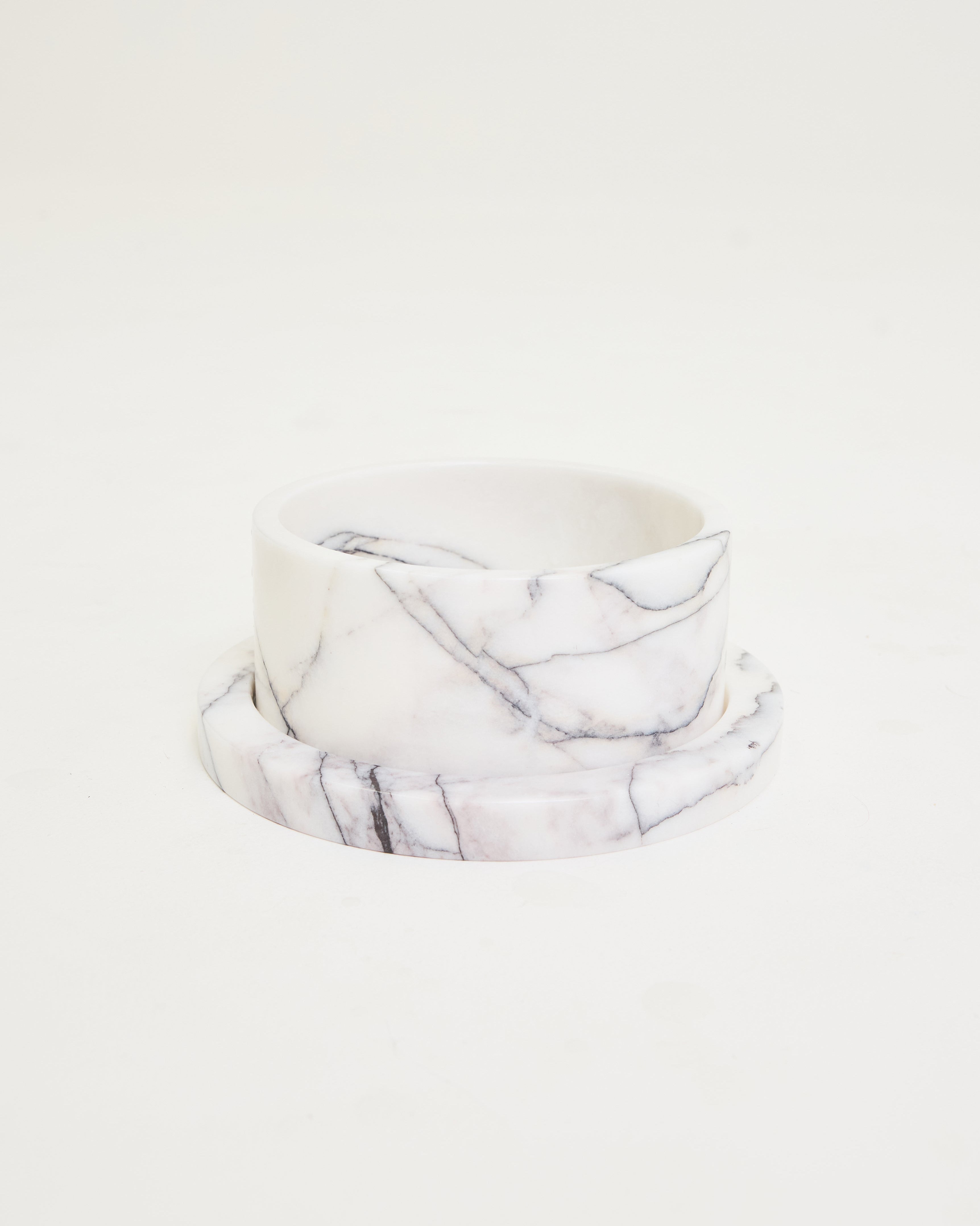 Marble dog bowls on a white background