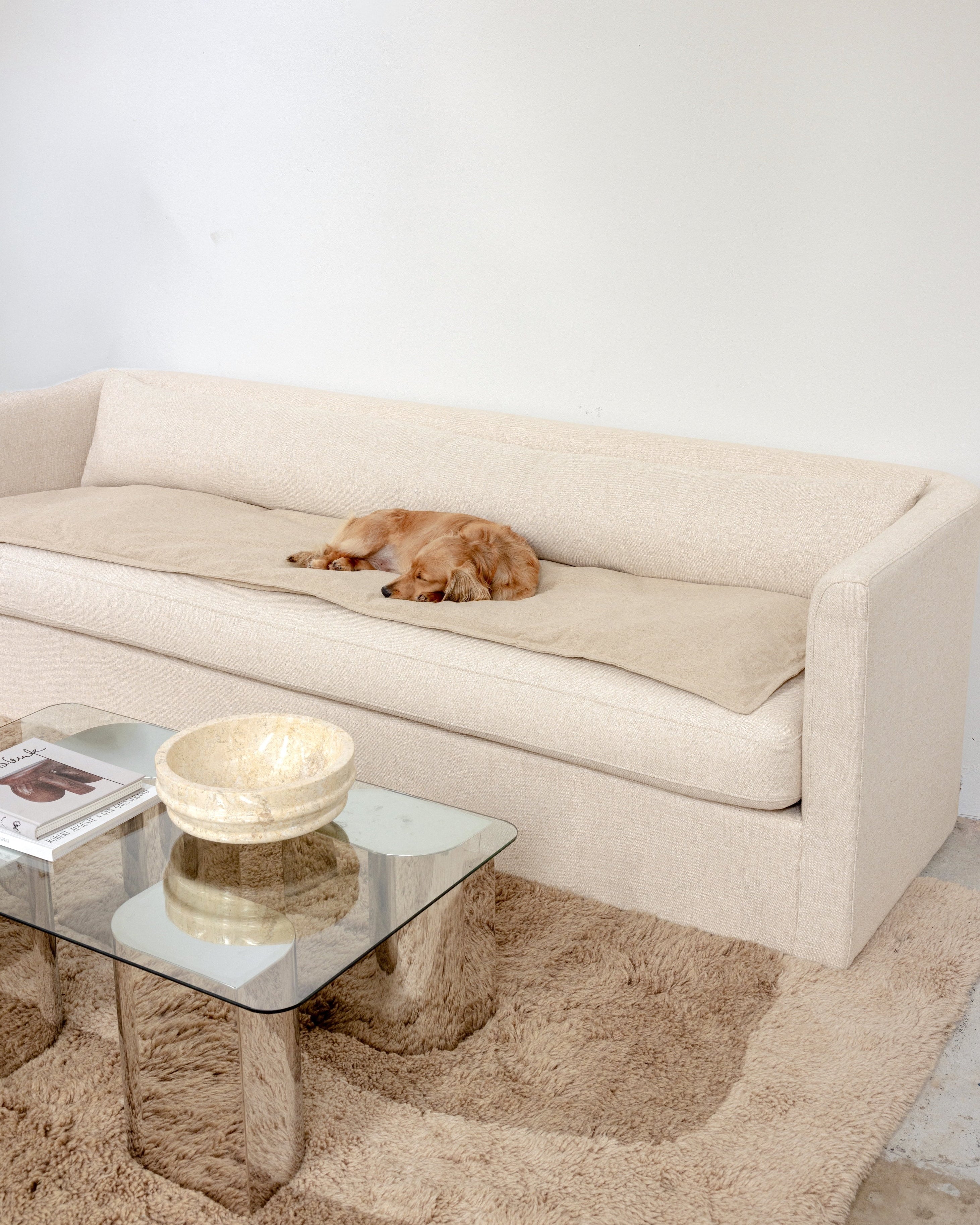 Stop covering your sofa up with boring slipcovers and throws - here's what to use instead